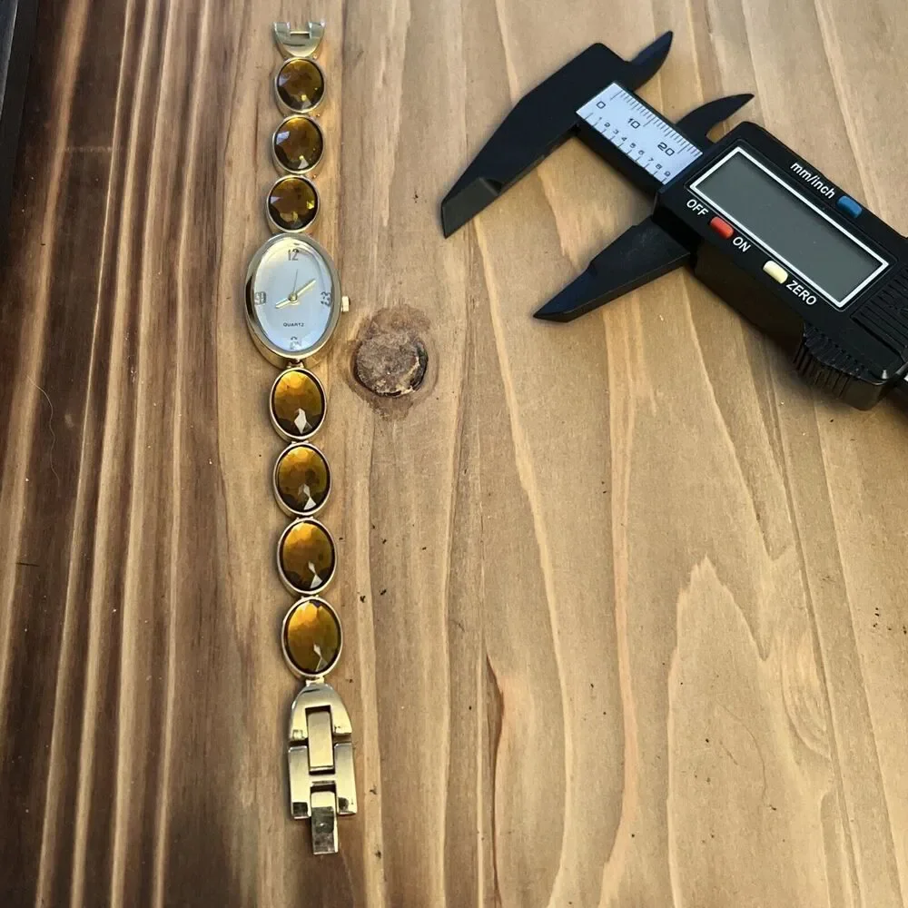 Unbranded Gold Tone Ladies Watch With Gems